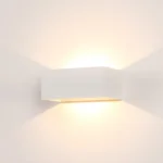 Minimalist rectangular white aluminum wall sconce (SHLP80229) that casts dramatic up and down light beams.